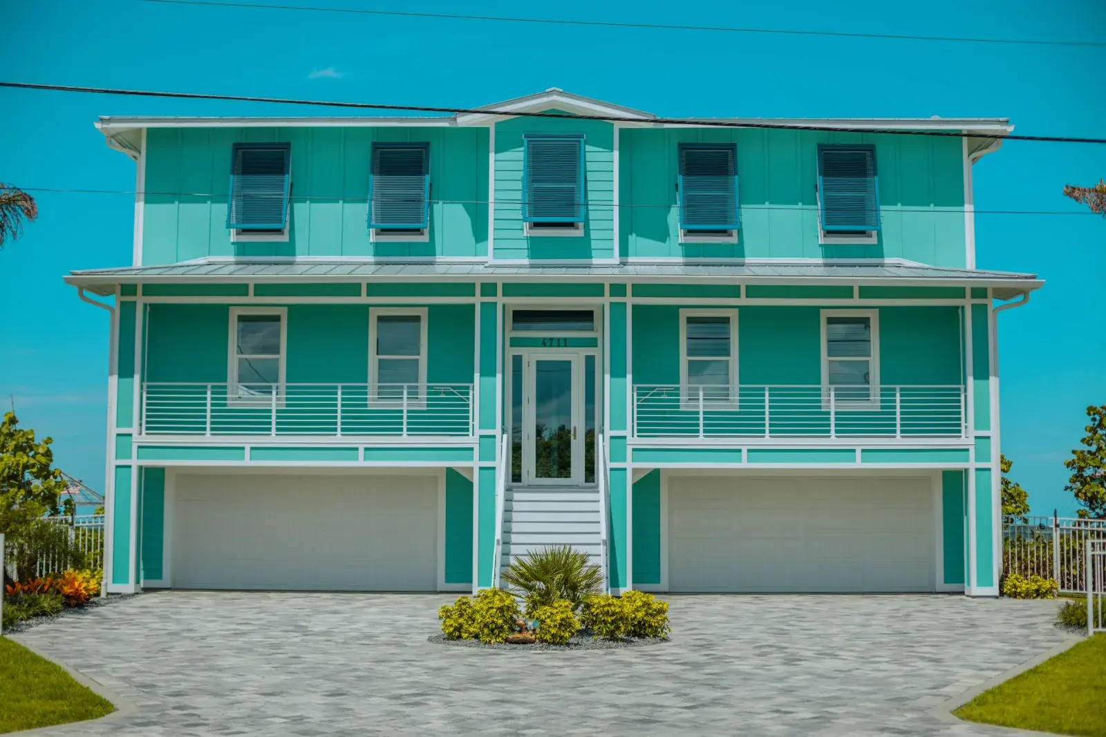 Modern beach house on the Florida coast, representative of Indian Harbour Beach, FL's barrier-island construction