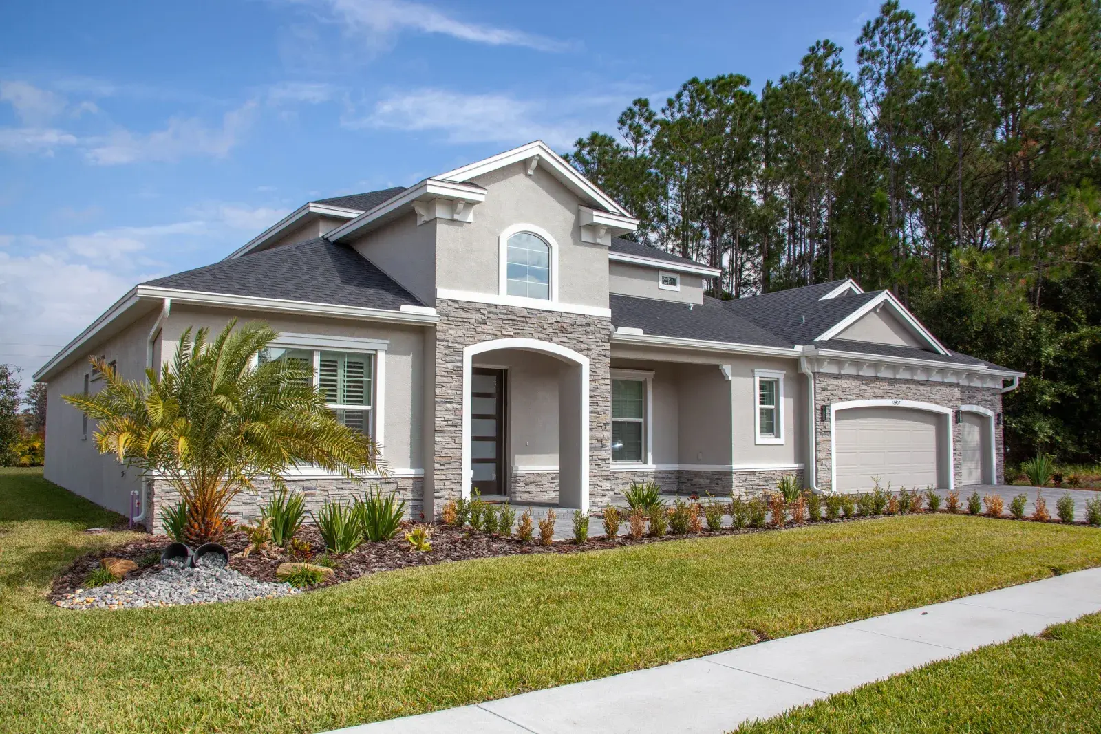 Suburban Florida home with mature landscaping, representative of Suntree, FL's established 1980s-90s neighborhoods